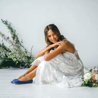 Cobalt blue Talaria Flats shoes with a sleek design, featuring smooth leather and a comfortable flat sole.