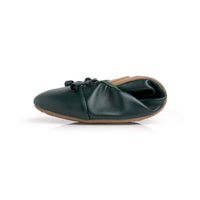 Green Talaria Flats shoes, premium evergreen slip-on footwear with a folded design, showcasing stylish and comfortable flats.