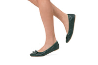 Green Talaria Flats shoes with a sleek, premium evergreen design, showcasing comfortable slip-on footwear for everyday wear.