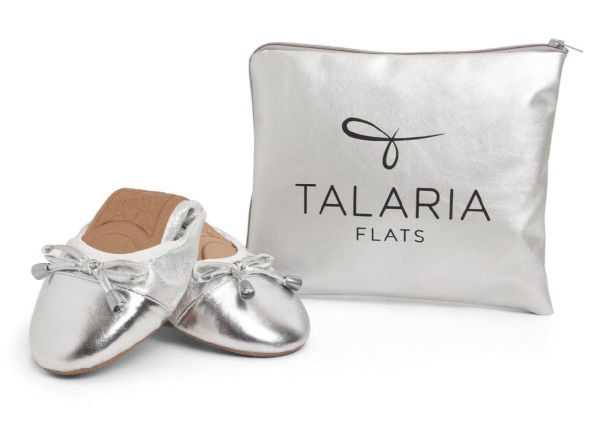 Silver flats shoes by Talaria Flats with a sleek, minimalist design and comfortable slip-on style.
