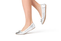 Silver flats by Talaria Flats, premium women's shoes with sleek design and comfortable fit, shown on a clean white background.