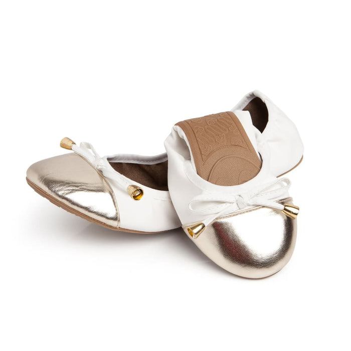 Talaria Flats premium white shoes with sleek design and comfortable fit, shown from side angle.