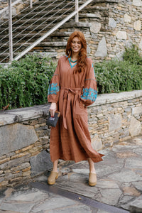 A Little Rusty by Tela Luxury Mercantile featuring a rustic, weathered metal decorative piece with a vintage finish.
