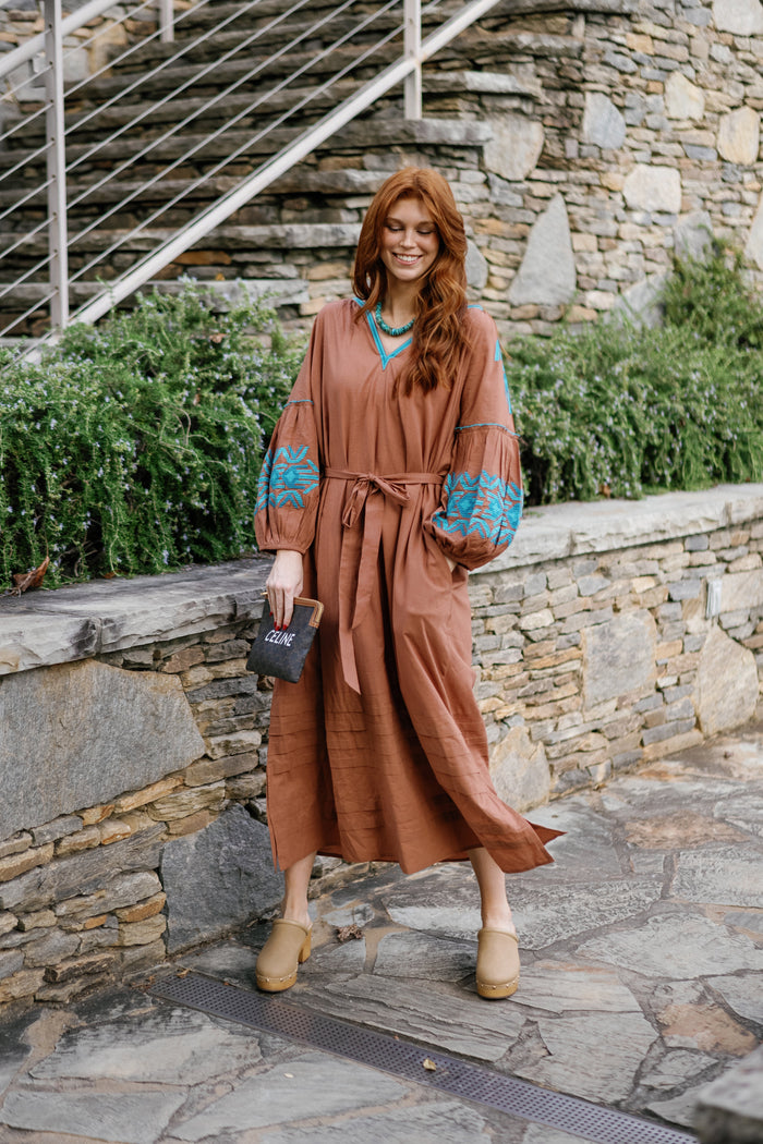 A Little Rusty by Tela Luxury Mercantile featuring a rustic, weathered metal decorative piece with a vintage finish.