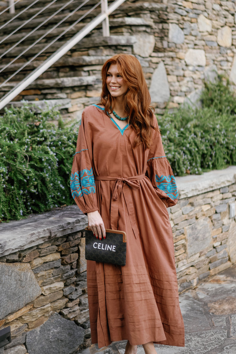 A Little Rusty by Tela Luxury Mercantile featuring a rustic, textured surface with warm, earthy tones and vintage-inspired design.