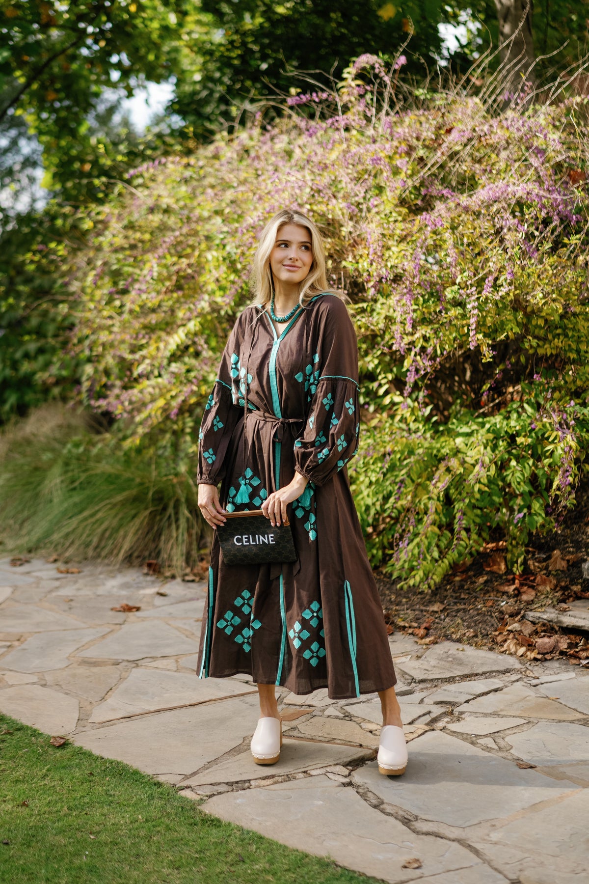 Brown is the New Black Teal luxury handbag by Tela Luxury Mercantile, featuring smooth leather and elegant design.