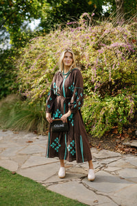 Brown is the New Black Teal luxury handbag by Tela Luxury Mercantile, featuring smooth leather and elegant design.
