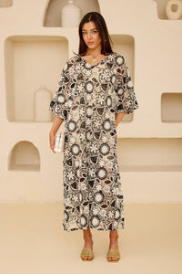 Calypso Crochet by Tela Luxury Mercantile, showcasing a detailed, handwoven crochet fabric in vibrant colors and intricate patterns.