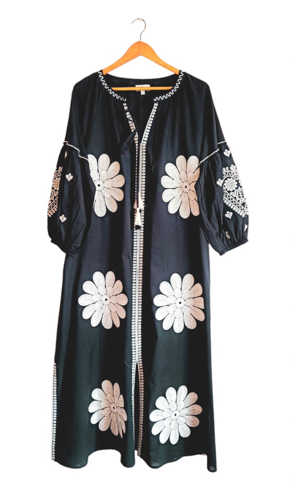 Tela Luxury Mercantile Dawgs Dress featuring stylish design, comfortable fabric, and vibrant colors perfect for casual wear.