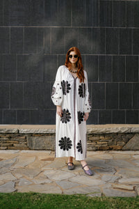 Tela Luxury Mercantile Go Team! decorative graphic print on fabric featuring bold text and vibrant colors.