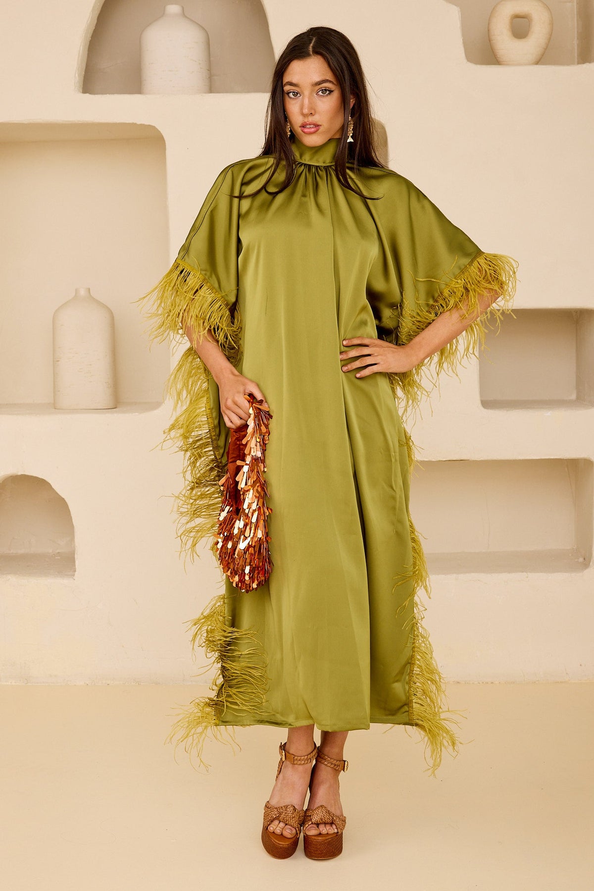 Mariposa product by Tela Luxury Mercantile featuring elegant design with intricate detailing and luxurious fabric.