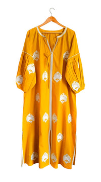 Mellow Yellow fabric by Tela Luxury Mercantile, close-up view of soft, vibrant yellow textile material.