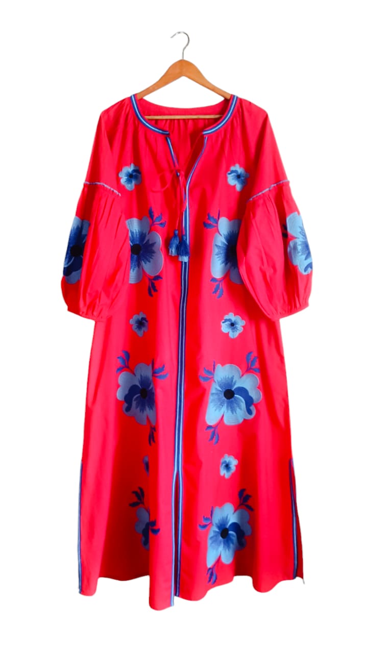 Grove Girl by Tela Luxury Mercantile, a stylish woman wearing a cozy, elegant outfit with layered accessories.