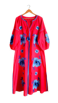 Grove Girl by Tela Luxury Mercantile, a stylish woman wearing a cozy, elegant outfit with layered accessories.