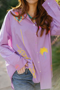 Lover Oxford lavender-colored shirt by Tela Luxury Mercantile, shown in a close-up of the collar and button details.