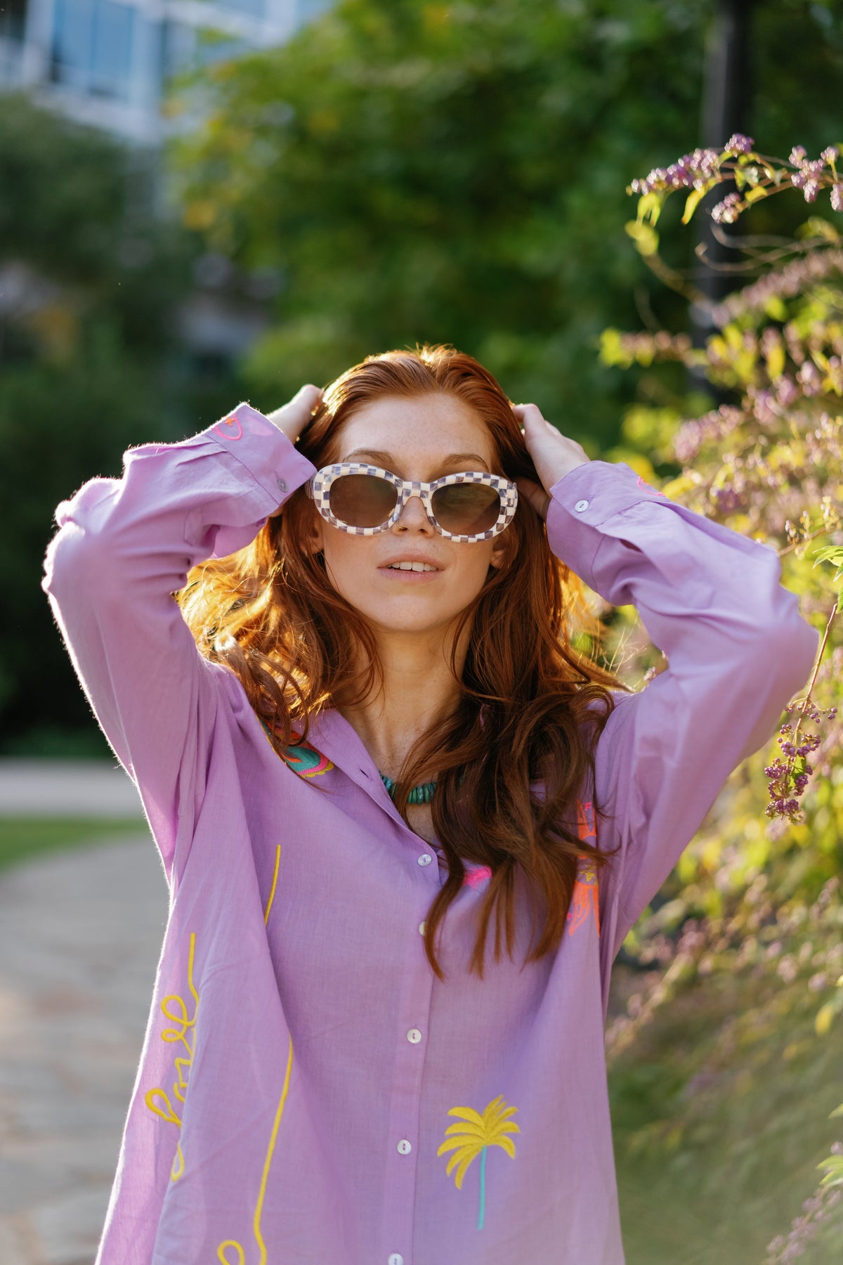 Lavender Lover Oxford shirt by Tela Luxury Mercantile, featuring a classic button-down design and soft lavender fabric.