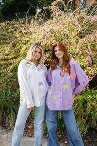 Light purple Lover Oxford shirt by Tela Luxury Mercantile, featuring a classic collar and button-down front.
