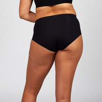 Black The Hi-Waist Hug from The Only Bra, high-waist shaping underwear, shown on a model.