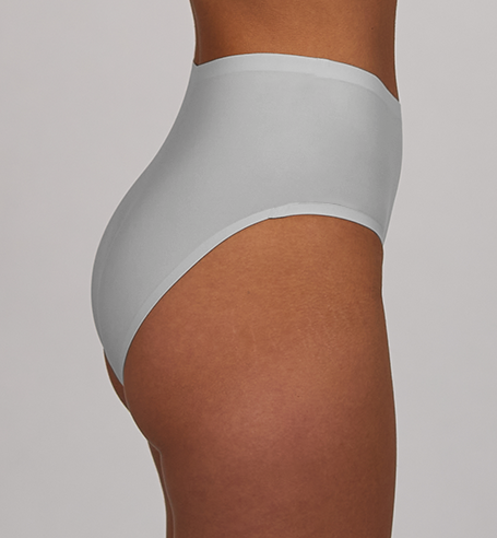 Black The Only Bra Hi-Waist Hug shapewear with high-waist design, shown on a model emphasizing its snug fit and smooth silhouette.