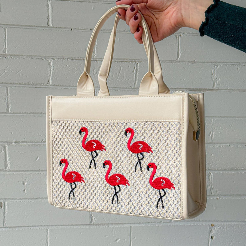 Pink leather Classic Flamingo Purse by The Popular Flamingo, featuring a stylish flamingo design and gold-tone hardware.