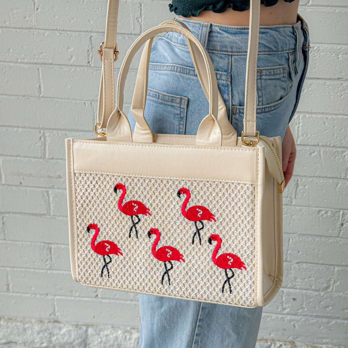 Bright pink classic flamingo purse from The Popular Flamingo featuring a playful flamingo design and a stylish compact shape.