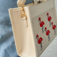 Classic Flamingo Purse by The Popular Flamingo featuring a pink flamingo design and a stylish, compact handbag shape.