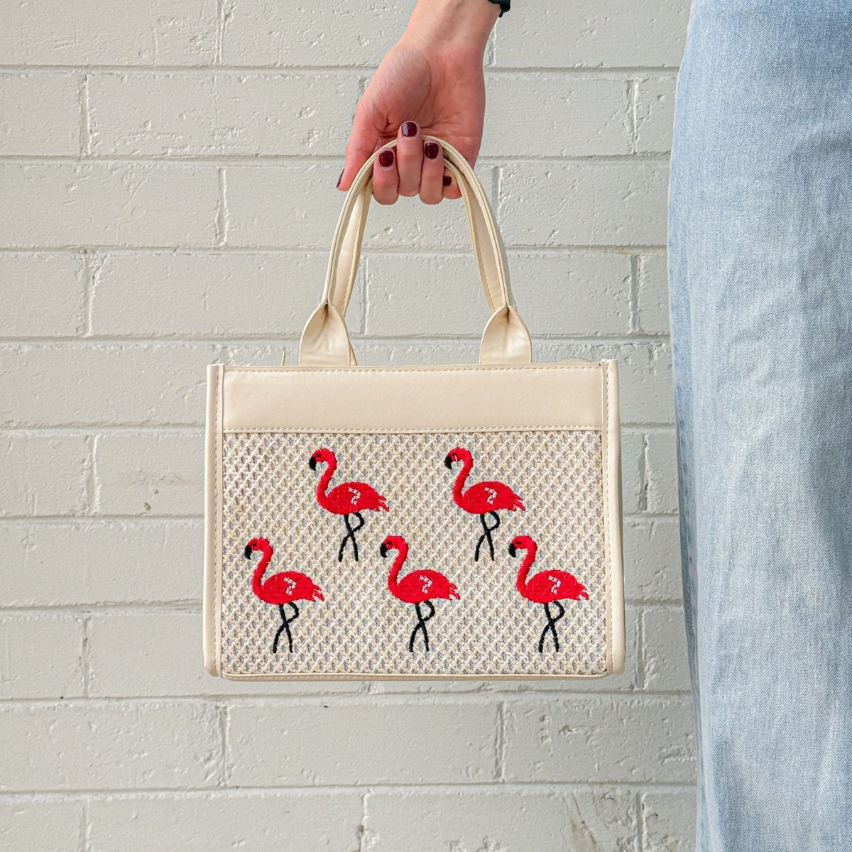 Classic flamingo purse by The Popular Flamingo featuring a pink flamingo design and stylish handbag shape.