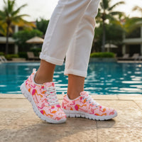 Multicolor pink flamingo sneakers by The Popular Flamingo featuring vibrant design and comfortable casual style.