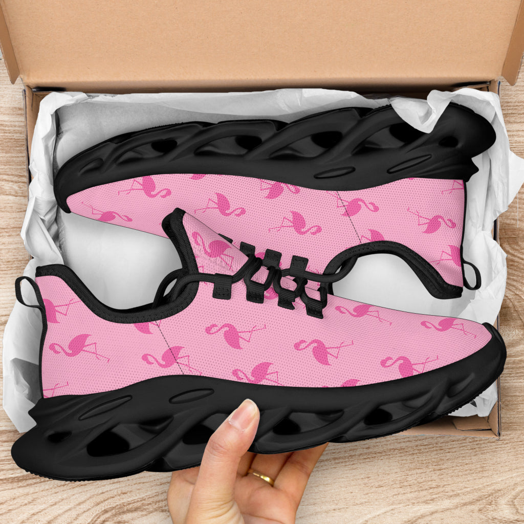 Simple pink flamingo sneakers by The Popular Flamingo with white midsoles, showcasing a casual, playful design.