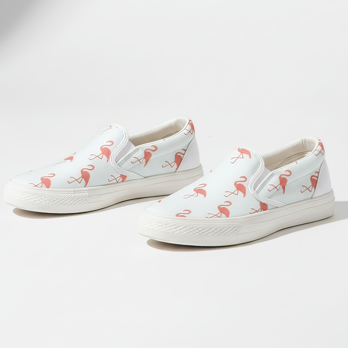 Simple Flamingo slip-on shoes for women by The Popular Flamingo, featuring a pink flamingo design and casual slip-on style.
