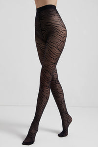 Black women's fantasy tights with animalistic lace interlacing from the Fantasy Tights Conte Sahara collection by Lornea.
