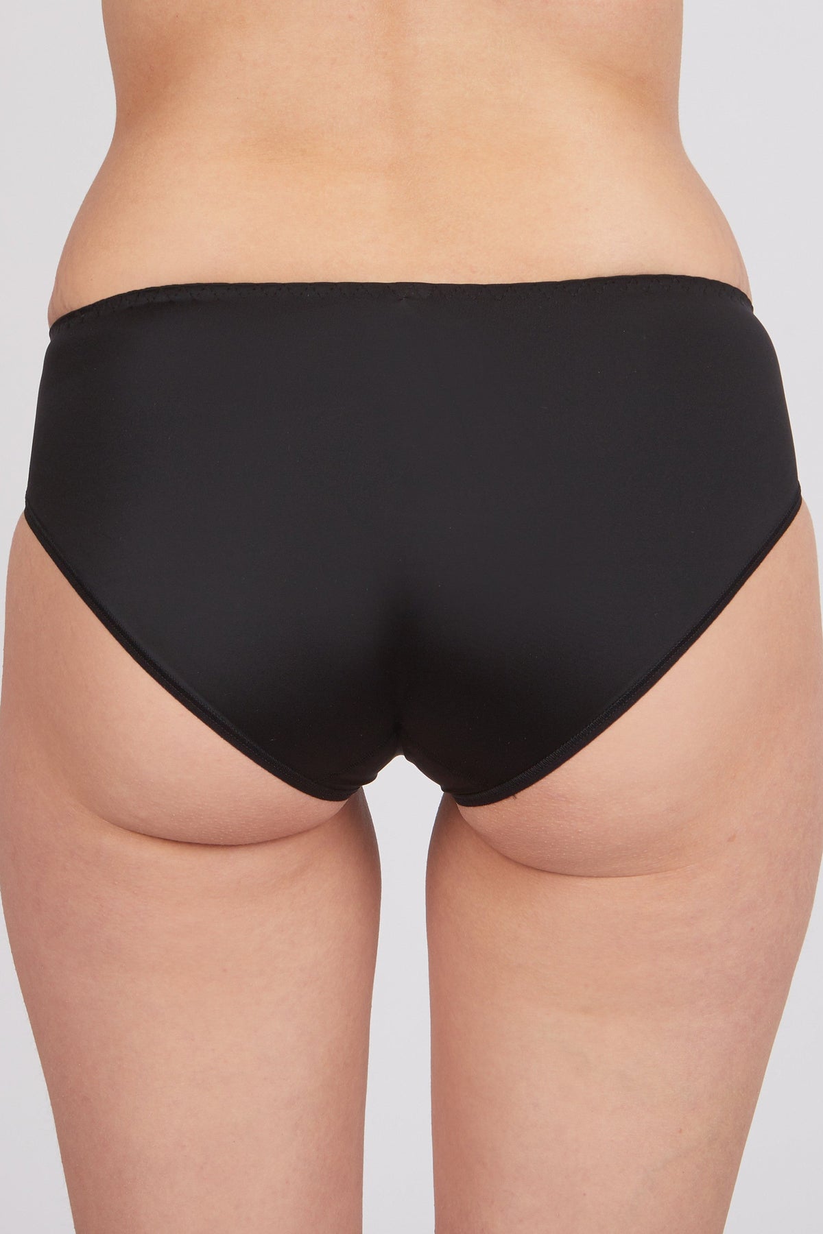 White medium-waisted culottes women's panties by Lornea, featuring a comfortable and stylish fit with soft fabric.