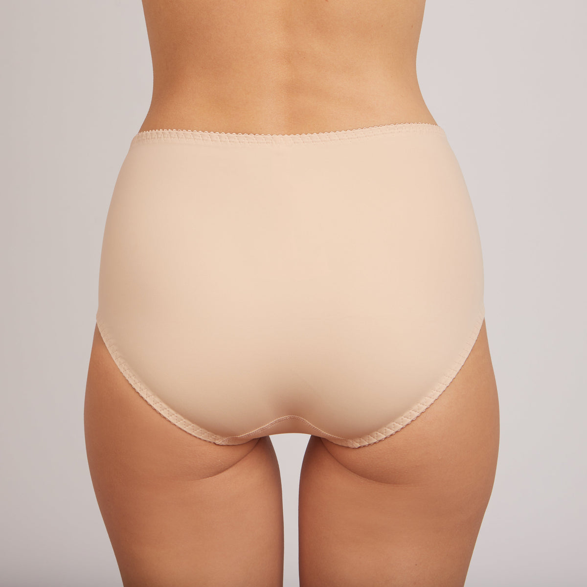 High-waisted nude crystal curve slip panties for women by Lornea, showcasing smooth fabric and elegant fit.