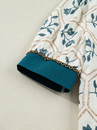Air force blue floral print polo collar casual mini dress by Trendsi, featuring a relaxed fit and vibrant floral design.