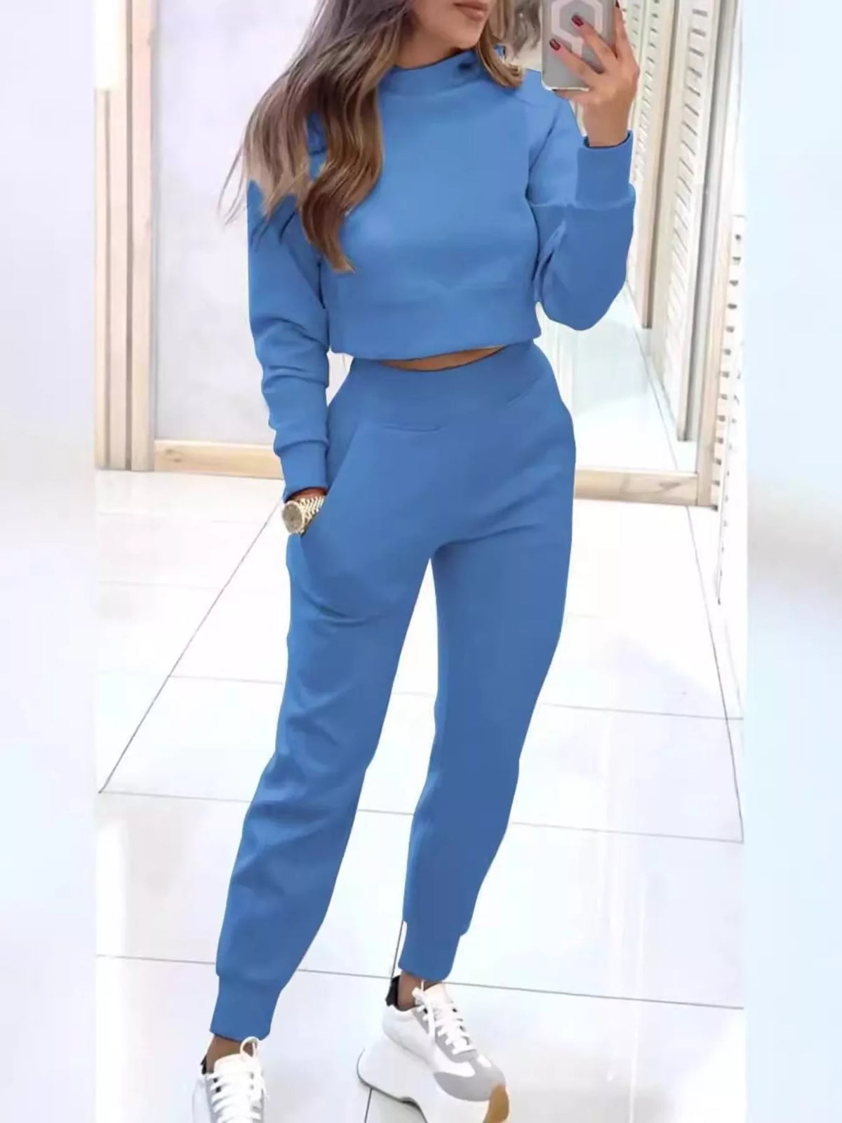 Apricot casual chic cropped sweatshirt and matching jogger set by Trendsi, stylish and comfortable for everyday wear.