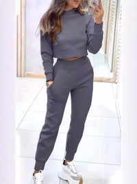 Apricot casual chic cropped sweatshirt and jogger set by Trendsi, featuring a relaxed fit and comfortable fabric.