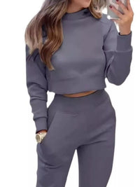 Apricot casual chic cropped sweatshirt and jogger set by Trendsi, featuring comfortable fit and stylish loungewear design.