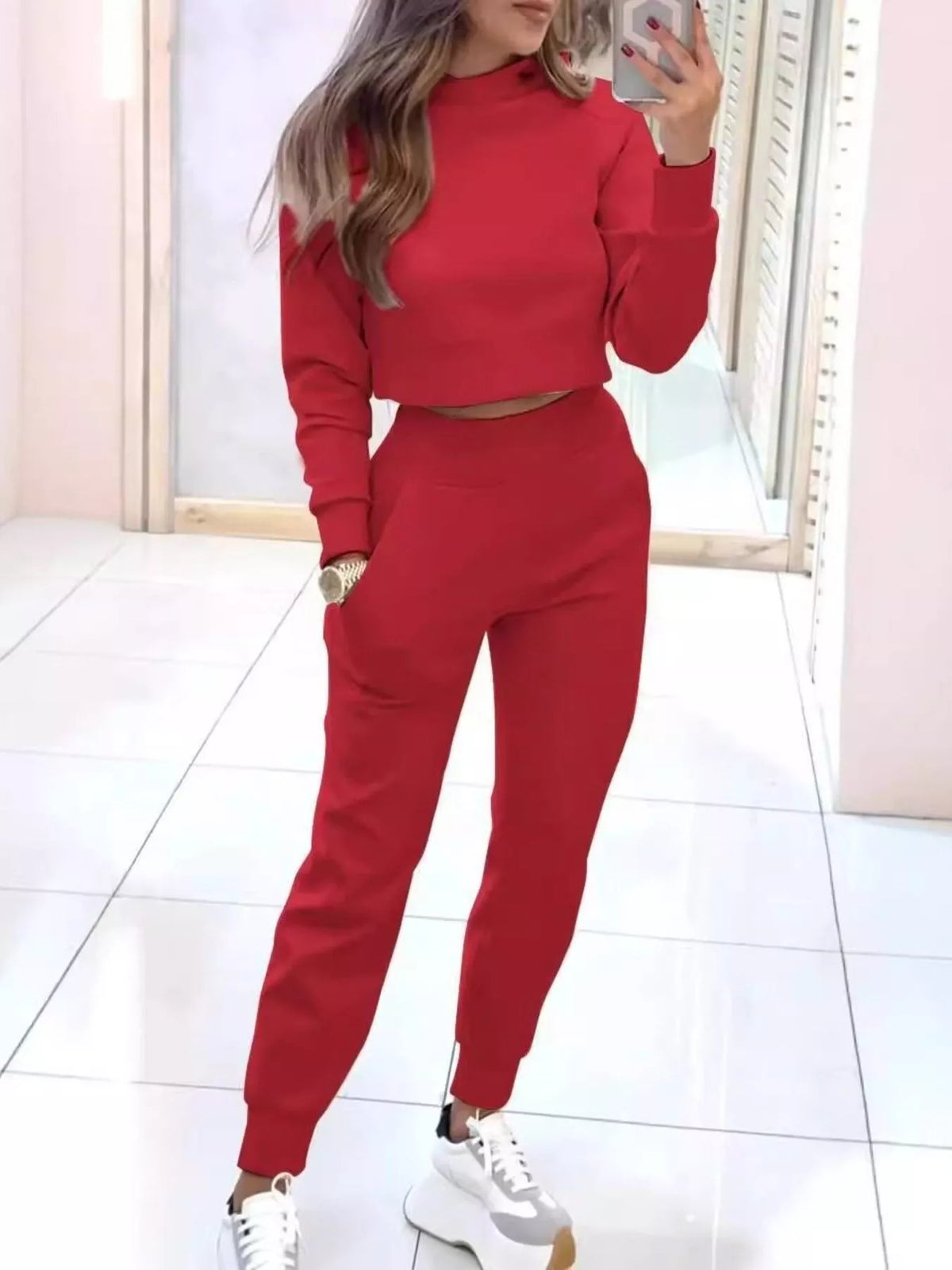 Trendsi apricot casual chic cropped sweatshirt and matching jogger set, comfortable and stylish for everyday wear.