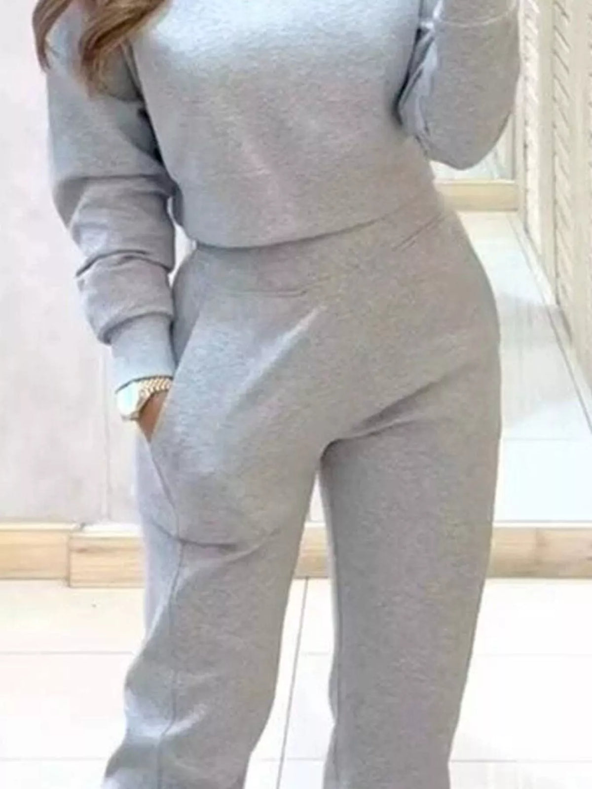 Apricot casual chic cropped sweatshirt and matching jogger set by Trendsi, comfortable and stylish loungewear ensemble.