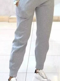 Trendsi apricot casual chic cropped sweatshirt and matching jogger set, comfortable and stylish for everyday wear.