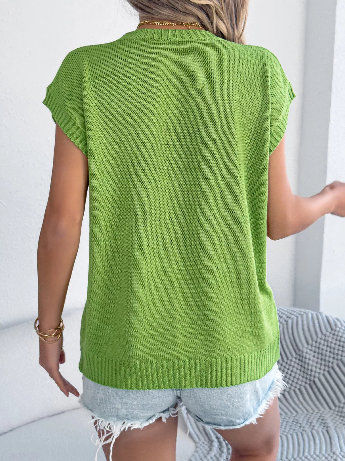 Apricot flower pattern round neck sweater by Trendsi, cozy knit with floral design, long sleeves, stylish casual wear.
