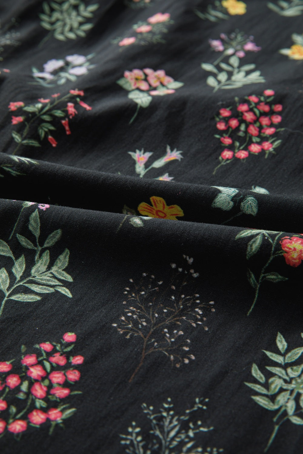 Black floral short sleeve shirt with contrast frilled trim, stylish trendy blouse by Trendsi.