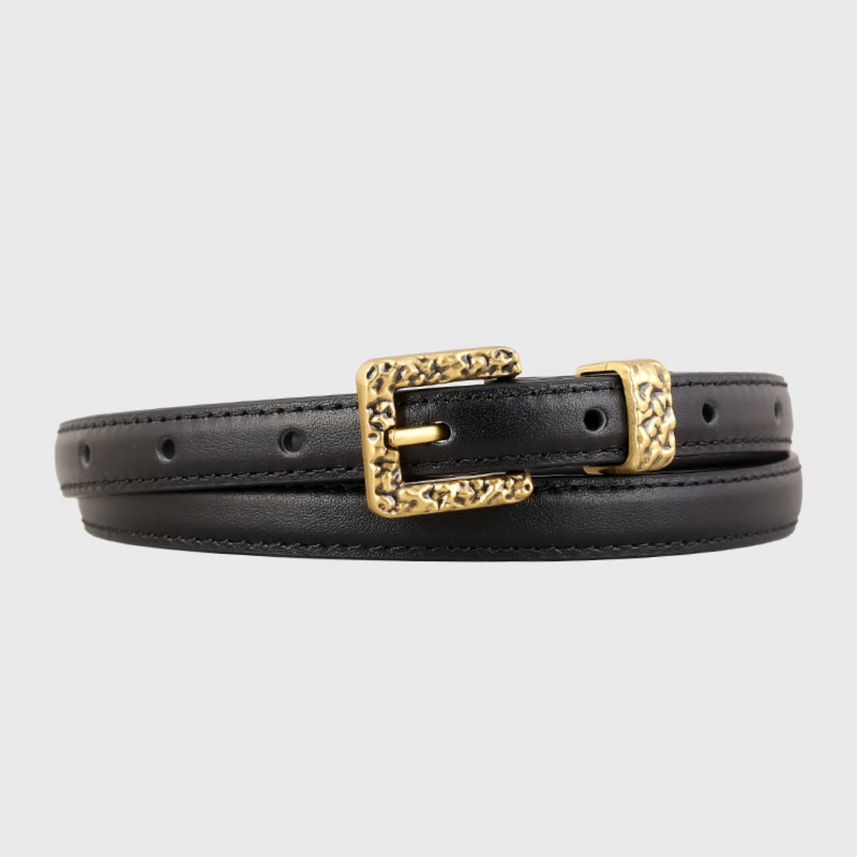 Black skinny leather belt with a silver buckle, stylish and sleek accessory from Trendsi.