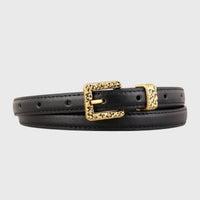 Black skinny leather belt with a silver buckle, stylish and sleek accessory from Trendsi.
