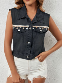 Black button-up denim vest from Trendsi, featuring a classic collar and sleeveless design with front buttons.