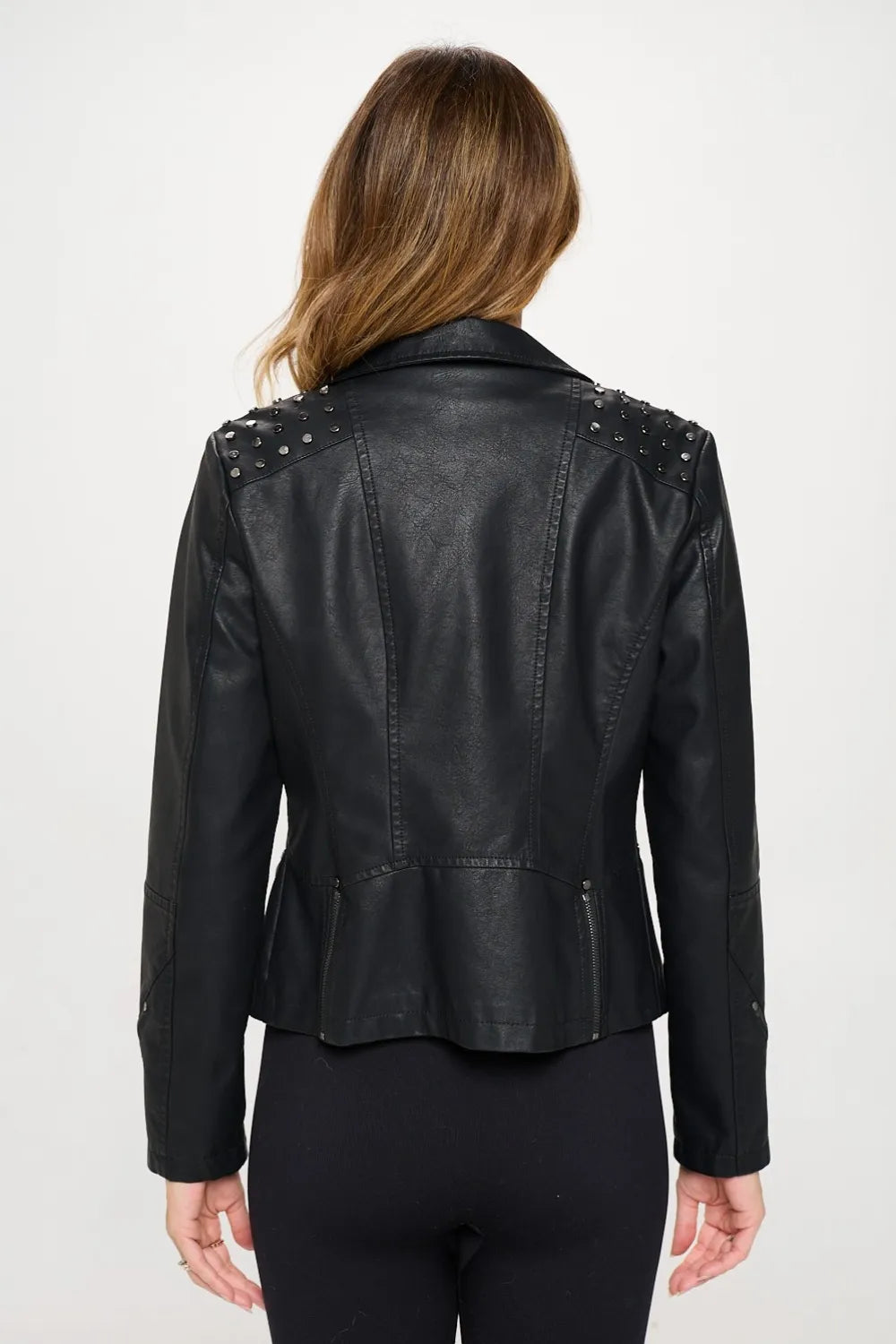 Black faux leather motorcycle jacket with silver studs, classic design, from Trendsi's Coalition LA Studded Moto collection.