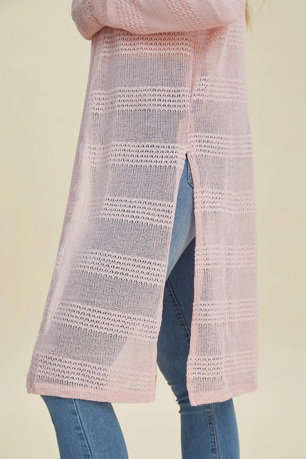 Black Trendsi Double Take full-size open front longline cardigan displayed on a model with a relaxed fit and long sleeves.
