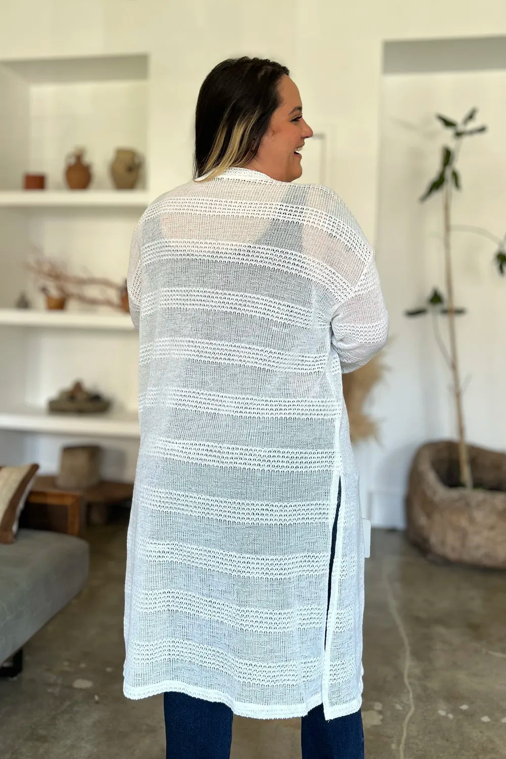 Black Trendsi Double Take open front longline cardigan featuring a full size, draped design and cozy knit fabric.