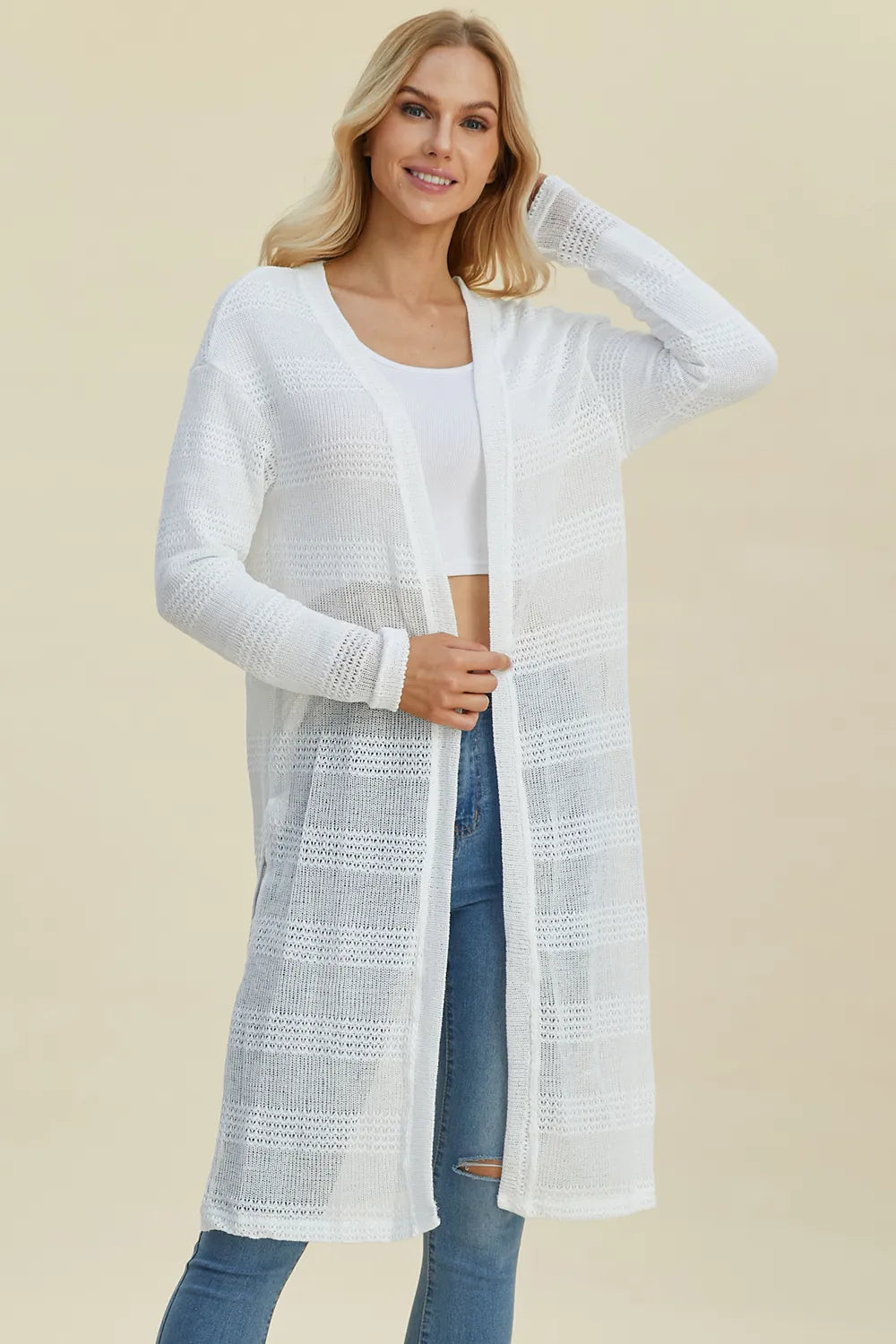 Black Trendsi Double Take open front longline cardigan, full size, with a relaxed fit and draped front, styled on a model.