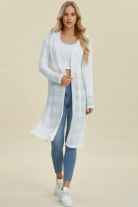 Black Trendsi Double Take full-size open front longline cardigan displayed on a model. Soft knit fabric and relaxed fit.